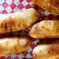 Pizza Rolls · Hand-wrapped rolls filled with pepperoni and cheese or chicken, cheese & sauce. Served with ...