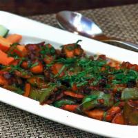 Chili Paneer · Spicy and veggie. Spiced homemade cheese cubes sauteed with ginger, garlic, and green chilie...