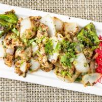 Salt & Pepper Fish · Spicy. Diced tilapia sauteed with crushed black pepper, ginger, garlic, onions, green pepper...
