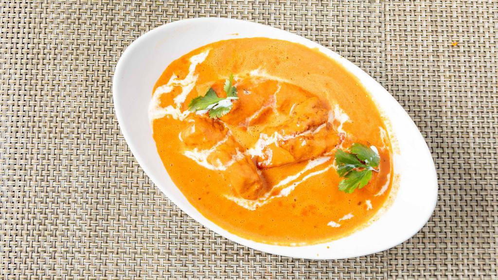 Makhani · The mild sauce made from plum tomatoes and regional spices enriched with butter. Served with rice.