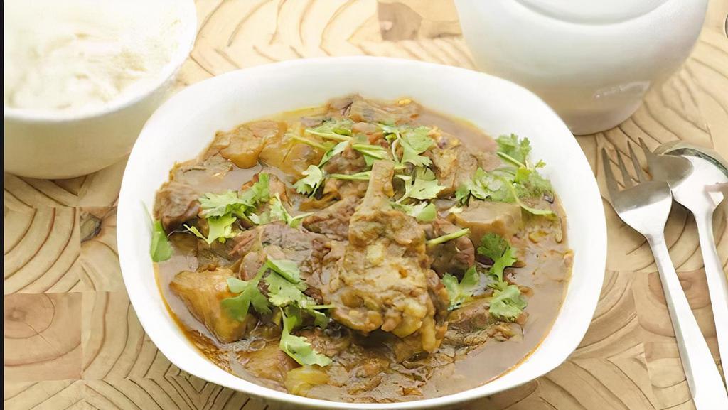 Kerala Goat Stew · WIth coconut milk, curry leaves, ground pepper and cardamom