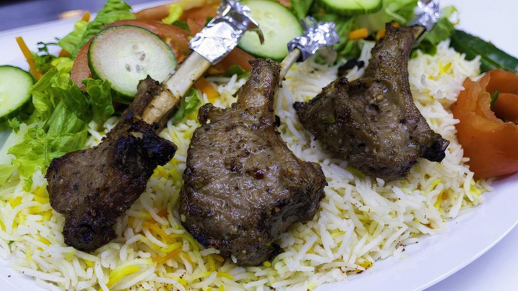 Lamb Chops (3 Pieces) · Three pieces marinated in fresh grated spices.
