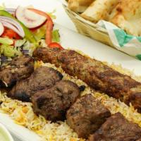 Shish Kabab · Lamb cubes  and chicken kabab grilled with tomato and onions.