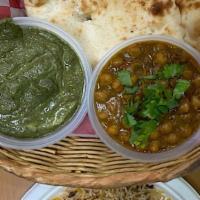 Vegi Platter · serve with spinach potato, chick peas, rice , salad , naan and sauce.