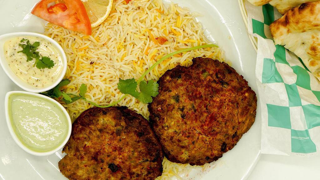 Chicken Chapli Kabab    · 2 Pieces of marinated minced meat.