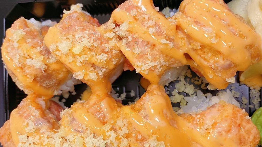 Spicy Girl Roll · Spicy tuna and tempura crunch with spicy salmon tempura crunch on top.
