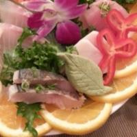 Sashimi Regular
 · 15pcs of assorted raw fish.
