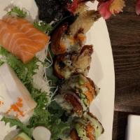 Double Dragon Roll  · Shrimp tempura inside topped with eel, avocado and tobiko.