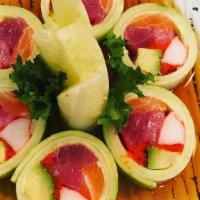 Rainbow Naruto  · Tuna, yellowtail, salmon, white fish, avocado wrapped with cucumber topped with tobiko.