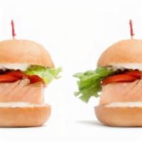 Salmon Jr · Two grilled salmon filet sandwiches with romaine lettuce, plum tomato and choice of lemon pe...