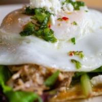 Duck Carnitas Taco · Braised duck, over easy egg, feta, greens, chimichurri sauce - GF