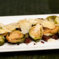 Brussels Sprouts · Fried brussel sprouts with smoked bacon, chive and parmesan cheese.