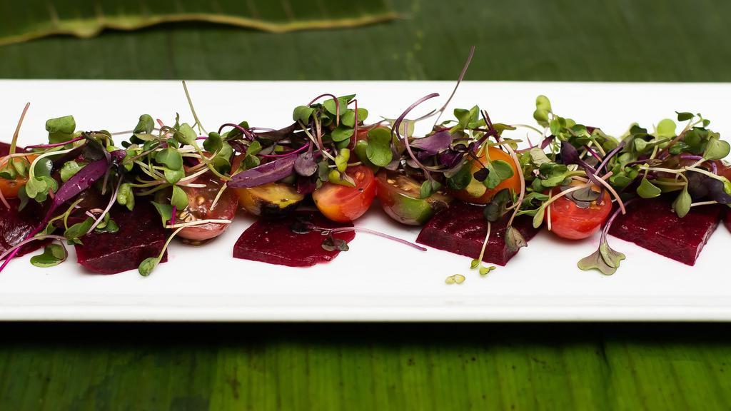 Baby Red Beet And Heirloom Tomato Salad · Vegetarian, vegan., gluten-free. roasted chilled beets, baby heirloom tomato, arugula & microgreens dressed with house red wine vinaigrette