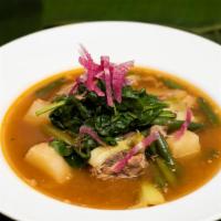 Pork Sinigang · Gluten-free. Traditional filipino soup comprised of braised pork, lemon broth, potato, green...