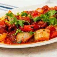 Chilly Chicken · Sweet and sour crispy fried chicken and bell peppers tossed in garlic, chili sauce and soya ...