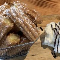 Churros With Ice Cream · Fried pastry dusted with cinnamon sugar.
