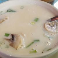 Tom Kha Soup · Mild and delicious coconut soup with galangal, lemongrass, mushroom, onion, and lime juice t...