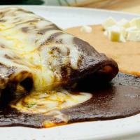 Build Your Enchiladas · Two rolled-in tortillas, filled with your favorite protein, topped with your choice of sauce...