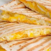 Breakfast Quesadillas · Our delicious flour tortillas are stuffed with Mexican chorizo, scrambled eggs, and cheese. ...