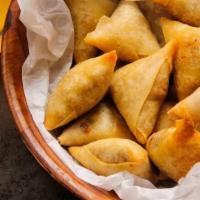 Vegetarian Sambusa · 7 pieces, filled with potato, sweet corn, green onions, cumin seed powder and other spices, ...