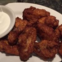 Regular Wings (10 Pieces) · Blue cheese dipping sauce.