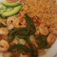Shrimp Fajita Dinner · Grilled shrimp seasoning just right, cooked w/fresh bell peppers, onions, tomato & served w/...