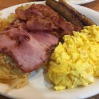 Cadillac Breakfast Special · Cadillac square specialty. 3 extra large eggs fried in butter, 2 rashers of bacon, 2 sausage...