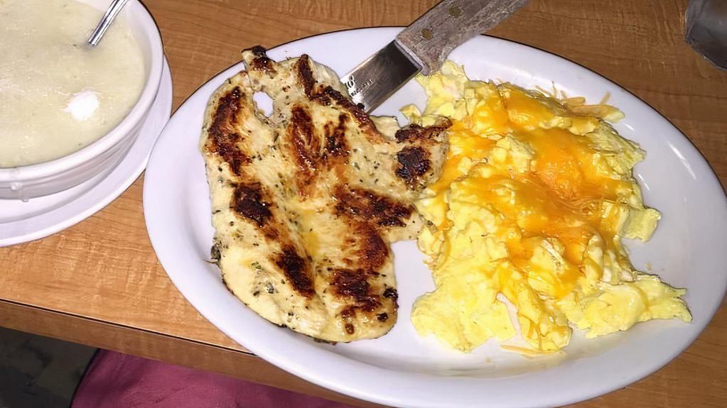 Grilled Chicken & Eggs · 1 piece of grilled chicken with 3 extra large eggs, with hash browns or grits or pancakes.