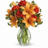Compton'S Fiery Lily And Rose · Spark someone's attention by sending this absolutely radiant bouquet. Full of flowers and fi...