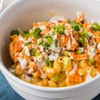 Buffalo Chicken Mac And Cheese · Shredded chicken over creamy house made mac and cheese topped with Bayou sauce, blue cheese ...