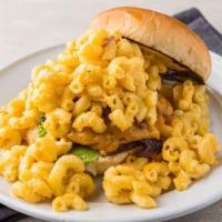 The Mac Burger · 1/3 Pound Angus beef patty with cheddar cheese and piled high with our house made mac and ch...