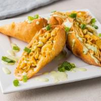 Crawfish Mac N Cheese Eggrolls · Delicious home made mac and cheese with crawfish tails stuffed inside a crispy fried eggroll...
