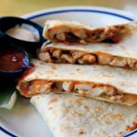 Cheeseburger Quesadilla · Flour tortilla filled with chopped cheeseburger, Mexican blend cheese, and BBQ sauce - grill...