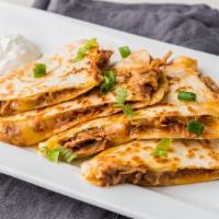 Pulled Pork Quesadilla · Flour tortilla filled with BBQ pulled pork, Mexican blend cheese, and BBQ sauce - grilled to...