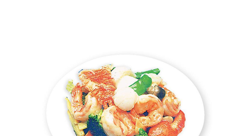 Seafood Combination · Fresh lobster meat, scallops, jumbo shrimp, crab meat and squid sauteed with assorted vegetables.