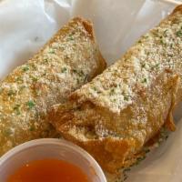 Turkey & Swiss Egg Rolls
 · Ground Turkey & Swiss deep-fried in an eggroll and served with a signature sauce.