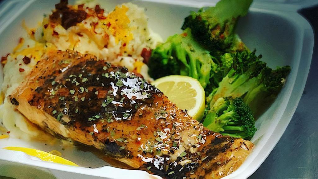Salmon Dinner · Charbroiled Atlantic Salmon fillet served with broccoli and loaded mashed potatoes.