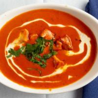Butter Chicken · Charbroiled chicken simmered in a creamy tomato-based gravy