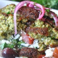 Falafel Salad · Enhance nutrition and taste with our popular Greek feta salad garnished with falafel crumble...