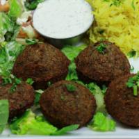 Falafel Platter · Five crispy vegetarian patties crafted from chickpeas, fava beans, herbs and spices served w...