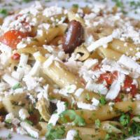 Marhaba Pasta · Penne pasta with home-made creamy white sauce, sun-dried tomatoes, olives, sautéed red bell ...