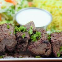 Beef Shish Kabob · Cubes of tender juicy top sirloin beef marinated to a flavorful delight grilled over wood fi...
