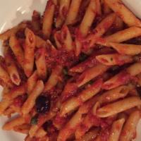 Penne Alla Puttanesca · olives, garlic, capers, and anchovies in a spicy tomato sauce.