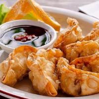 A6 Potstickers · A Thai dumpling filled with chicken and cabbage. Your choice of steamed or fried.