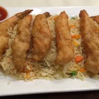 Shrimp Tempura · Shrimp marinated and fried in special tempura batter. Served with veg and fried rice.