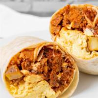 Tex Mex Burrito · Two scrambled eggs, breakfast potatoes, Chorizo sausage, cheese and salsa, wrapped in a flou...