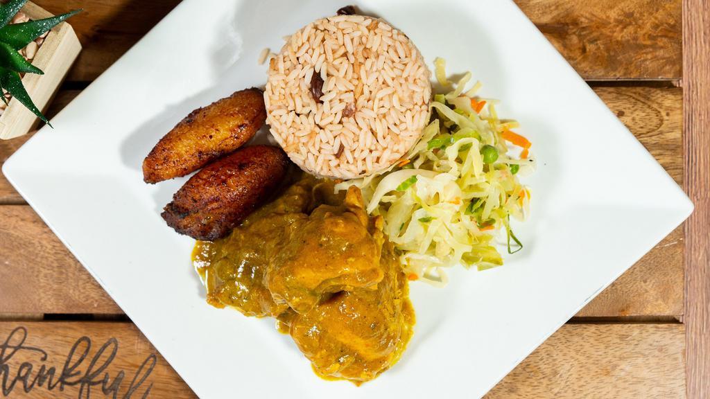 Curry Chicken · Served with your choice of White Rice, Yellow Rice, Rice and Beans, and steamed cabbage with 2 pieces of complimentary plantains.
