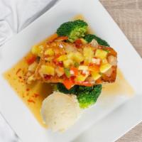 Pineapple Glaze Salmon · Served with your choice of white rice yellow rice or rice and peas cabbage and plantains.