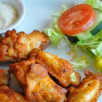 Buffalo Wings · You’re sure to want more of this finger-lickin’ chicken. (Side of ranch or blue cheese dippi...