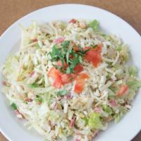Razzis Famous Chopped Salad (Half) · Diced chicken, salami, lettuce, fresh basil, diced tomatoes, garbanzo beans, scallions, mozz...